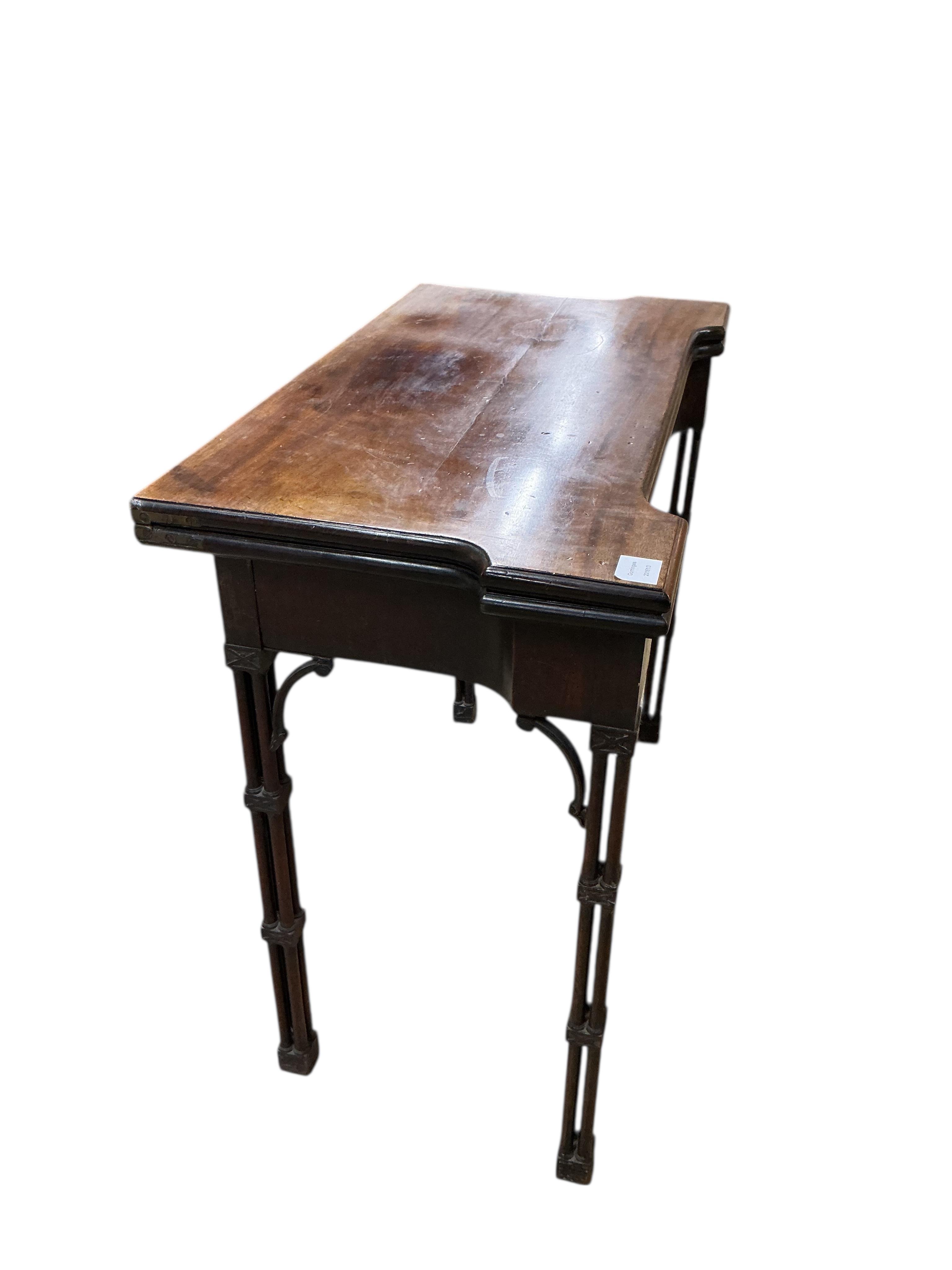A George III Chippendale style mahogany folding card table on cluster column legs, width 90cm, depth 45cm, height 74cm
